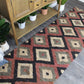 Natural Geo Spontaneous Jute Handwoven Black/Maroon/Green Geometric Area Rug